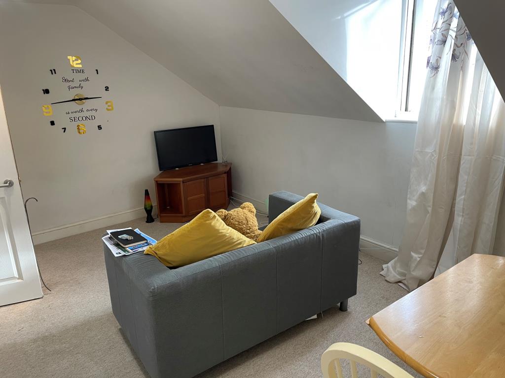 Lot: 96 - FREEHOLD RESIDENTIAL INVESTMENT - Second floor front living room with dormer window